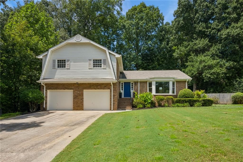 4 bedroom, 3 bathroom, 2,407 sq ft single family residence sold at 5148 N Peachtree Road, Dunwoody, GA 30338