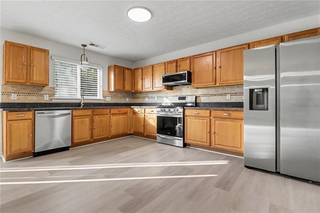 4 bedroom, 3 bathroom, 2,630 sq ft single family residence for sale at 2063 Rolling Rock Court, Lithia Springs, GA 30122 — photo 3