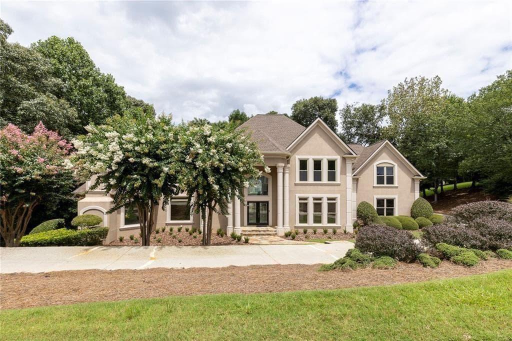 5 bedroom, 6 bathroom, 6,808 sq ft single family residence for sale at 8445 Sentinae Chase Drive, Roswell, GA 30076
