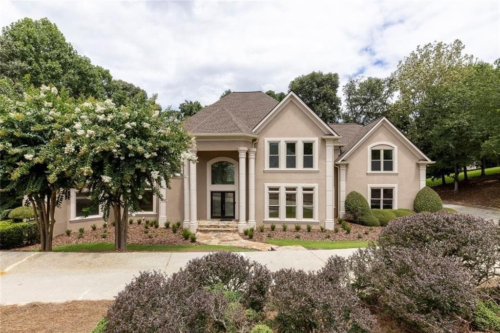 5 bedroom, 6 bathroom, 6,808 sq ft single family residence for sale at 8445 Sentinae Chase Drive, Roswell, GA 30076 — photo 2