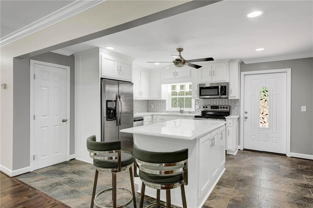 3 bedroom, 2 bathroom, 1,465 sq ft single family residence for sale at 10142 Puckett Street, Covington, GA 30014 — photo 5