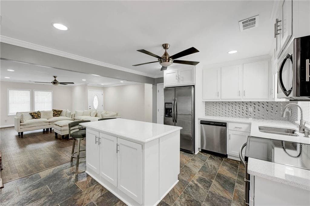 3 bedroom, 2 bathroom, 1,465 sq ft single family residence for sale at 10142 Puckett Street, Covington, GA 30014 — photo 6