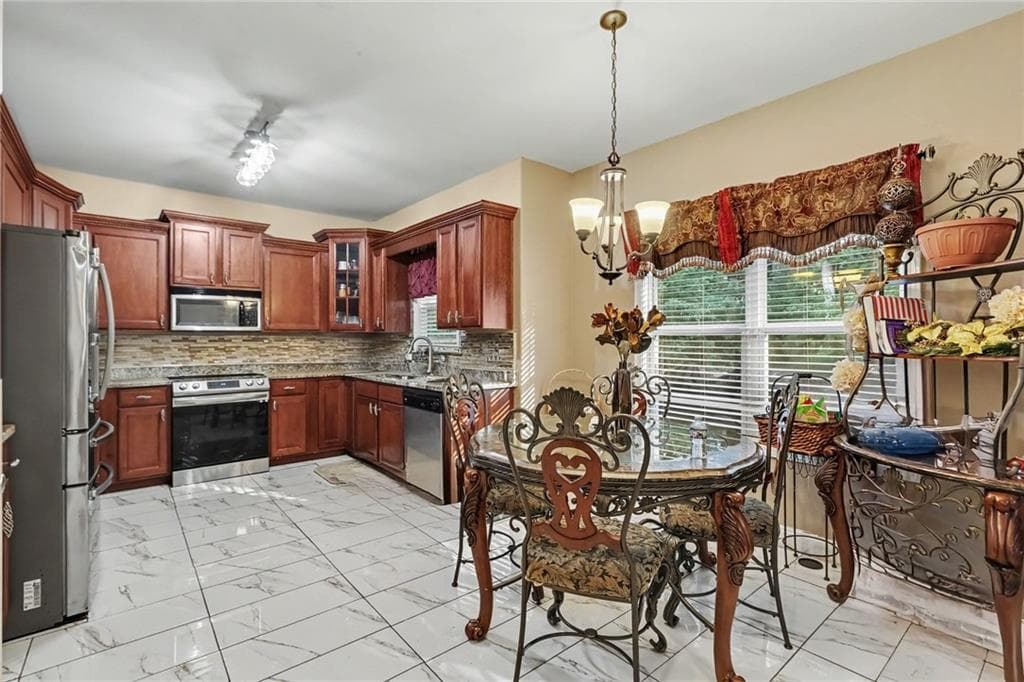 4 bedroom, 3 bathroom, 4,142 sq ft single family residence for sale at 6096 Willowpond Court, Douglasville, GA 30135 — photo 4