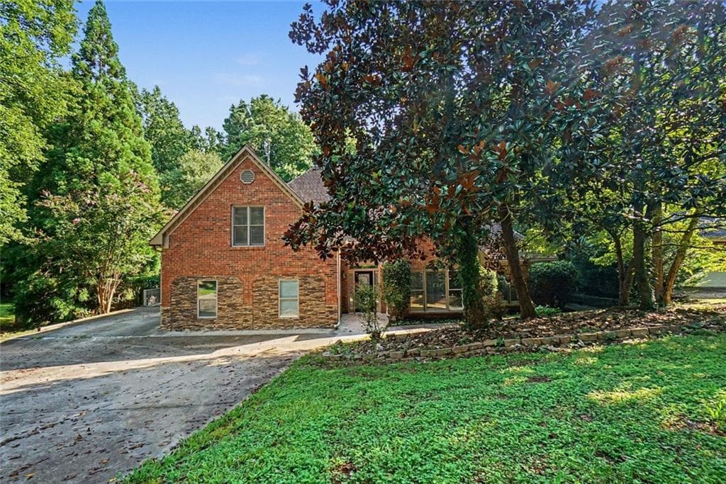 5 bedroom, 4 bathroom, 3,174 sq ft single family residence for sale at 5195 Hickory Bend Terrace, Woodstock, GA 30188 — photo 1 of 27