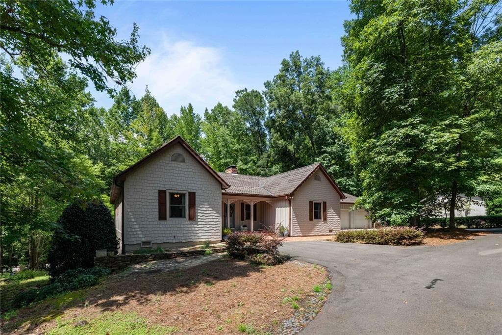 4 bedroom, 4 bathroom, 4,613 sq ft single family residence for sale at 1539 Jep Wheeler Road, Woodstock, GA 30188