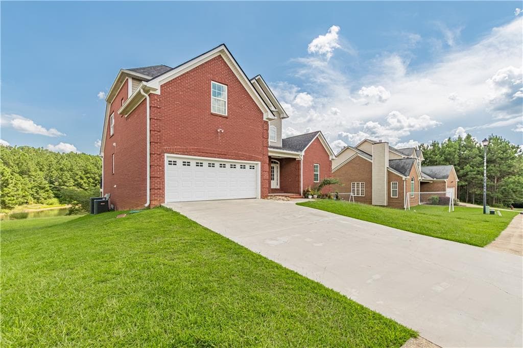 4 bedroom, 3 bathroom, 2,377 sq ft single family residence for sale at 25 Westmoreland Lake Drive, Buchanan, GA 30113 — photo 4