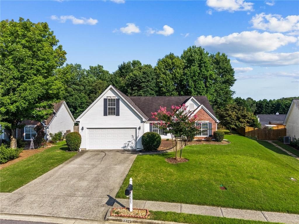 4 bedroom, 2 bathroom, 1,942 sq ft single family residence for sale at 3325 Mill River Cove, Buford, GA 30519 — photo 1 of 49