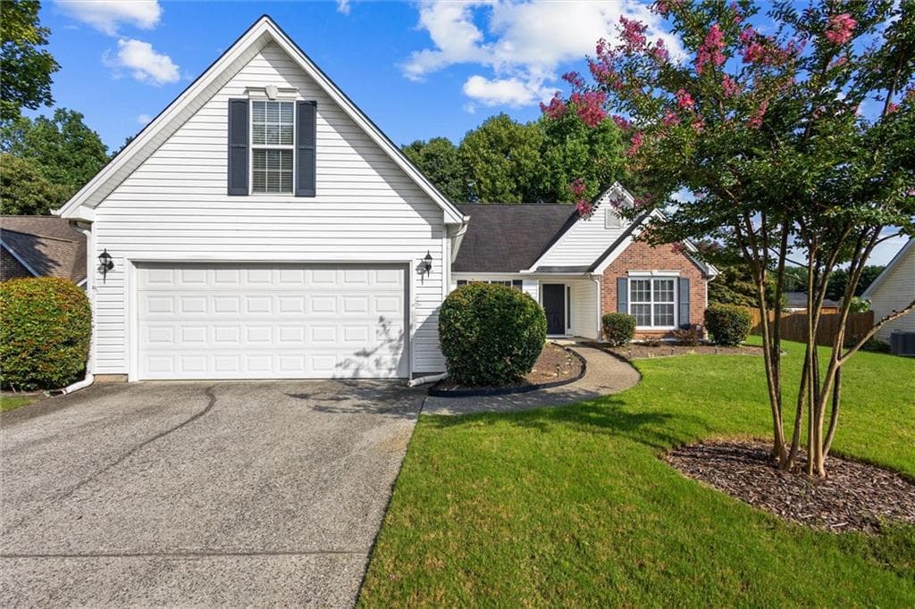 4 bedroom, 2 bathroom, 1,942 sq ft single family residence for sale at 3325 Mill River Cove, Buford, GA 30519 — photo 2