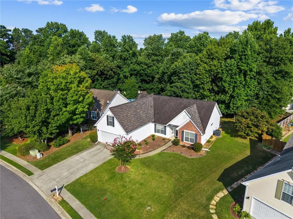 4 bedroom, 2 bathroom, 1,942 sq ft single family residence for sale at 3325 Mill River Cove, Buford, GA 30519 — photo 3
