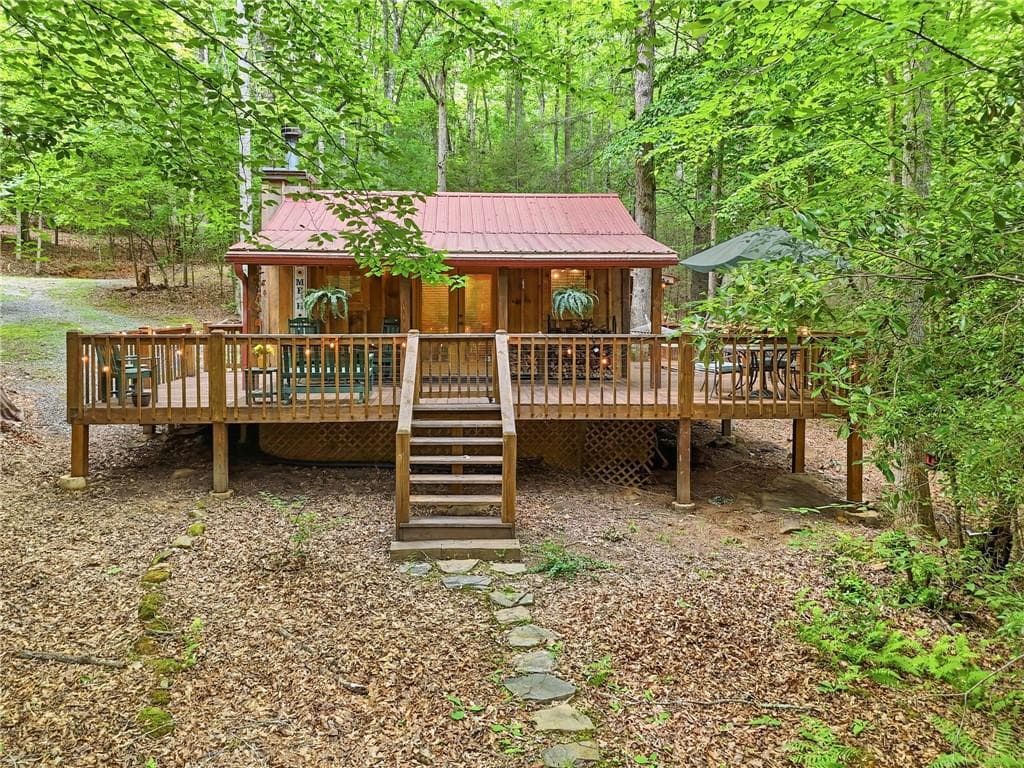 1 bedroom, 1 bathroom, 840 sq ft single family residence for sale at 167 Mangums Trail, Blue Ridge, GA 30513 — photo 2