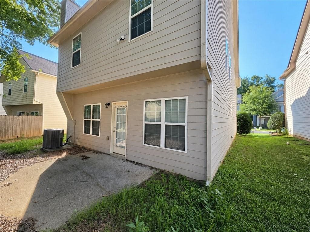 4 bedroom, 3 bathroom, 1,949 sq ft single family residence for sale at 5871 Apple Grove Road, Buford, GA 30519 — photo 2