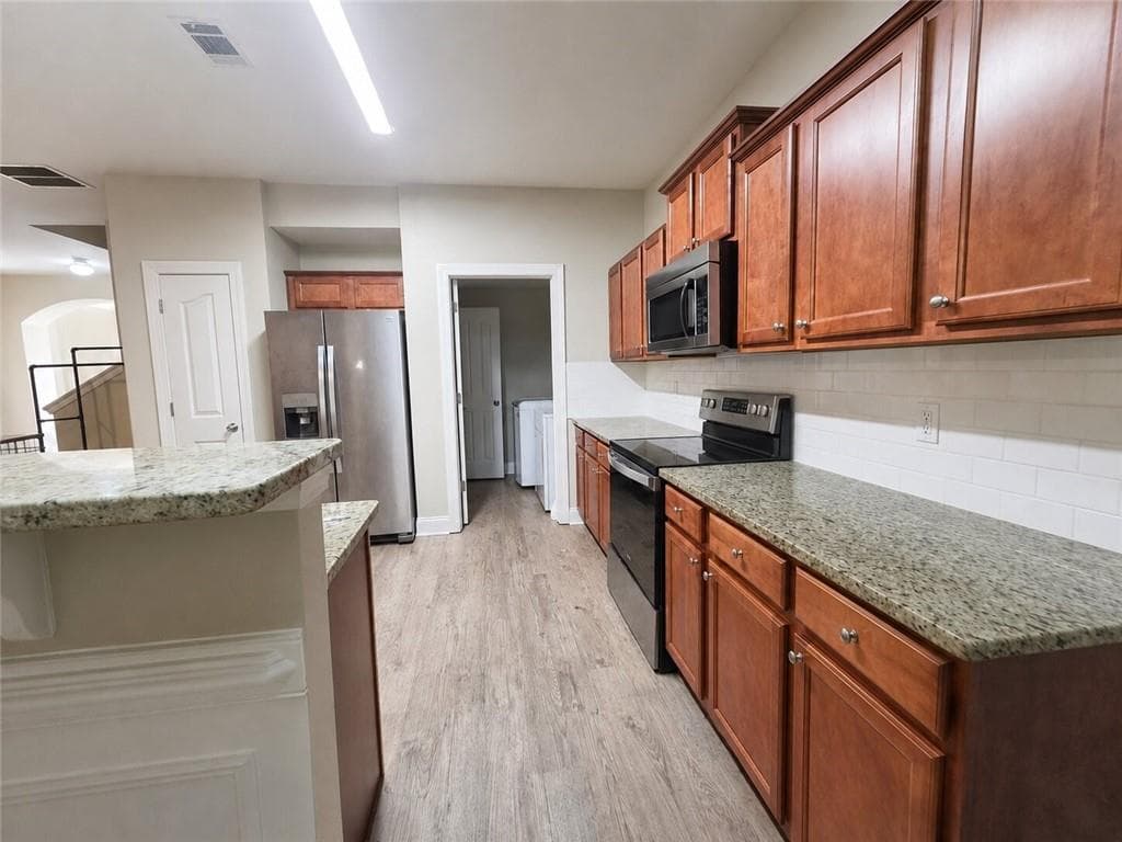 4 bedroom, 3 bathroom, 1,949 sq ft single family residence for sale at 5871 Apple Grove Road, Buford, GA 30519 — photo 6