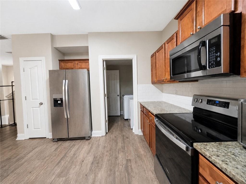 4 bedroom, 3 bathroom, 1,949 sq ft single family residence for sale at 5871 Apple Grove Road, Buford, GA 30519 — photo 7