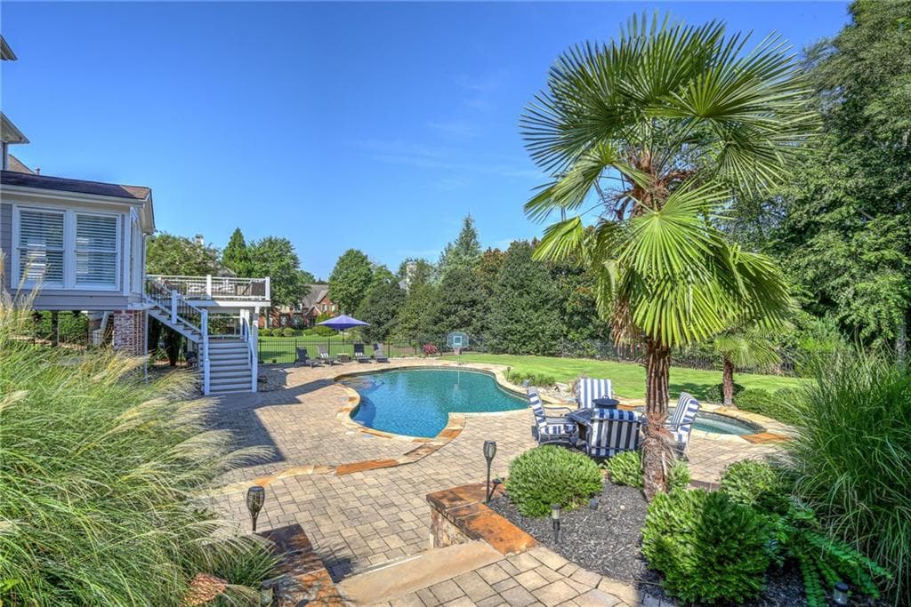 6 bedroom, 6 bathroom, 6,782 sq ft single family residence for sale at 1043 Meadow Club Court, Suwanee, GA 30024 — photo 7
