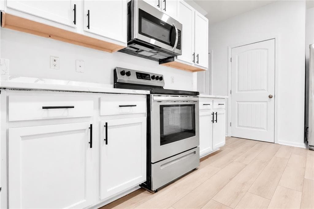 4 bedroom, 3 bathroom, 1,927 sq ft single family residence for sale at 418 Lake Ridge Lane, Fairburn, GA 30213 — photo 9
