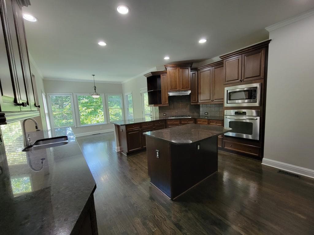 5 bedroom, 5 bathroom, 4,342 sq ft single family residence for sale at 6660 Granite Gate Pass, Cumming, GA 30028 — photo 10