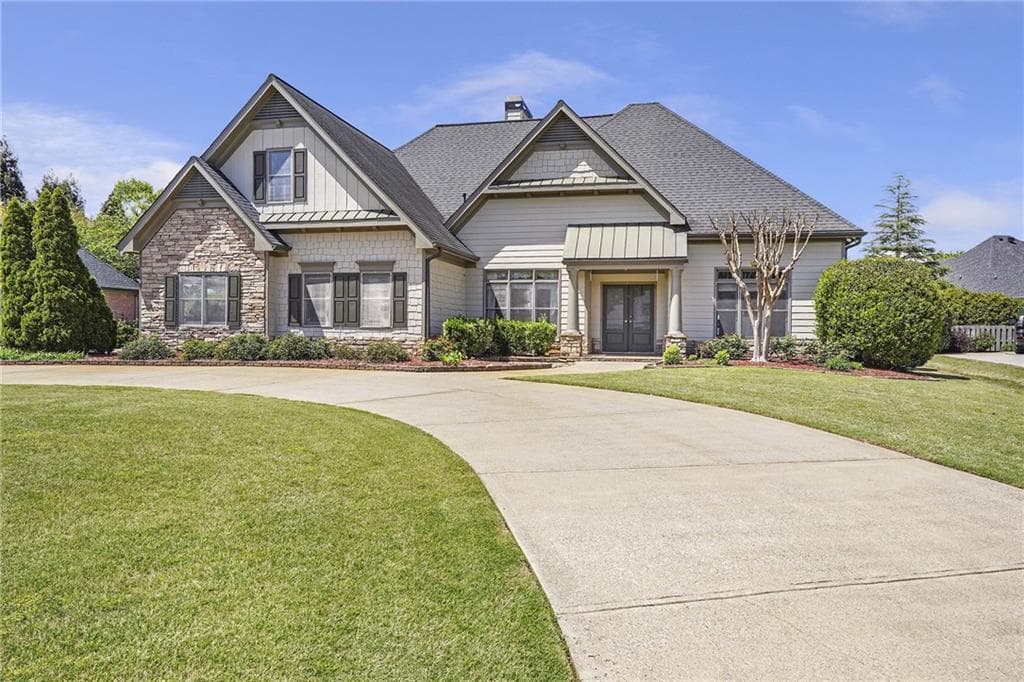 4 bedroom, 3 bathroom, 3,355 sq ft single family residence for sale at 7095 Grassmoor Grange Way, Cumming, GA 30040 — photo 1 of 22
