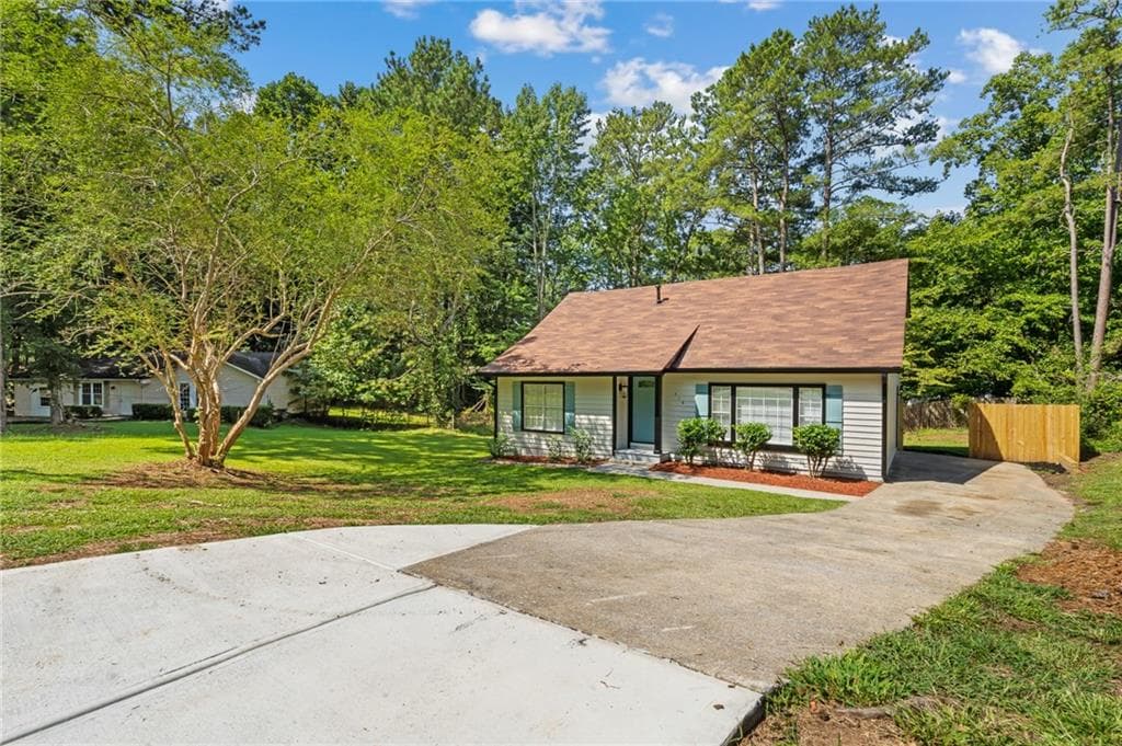 4 bedroom, 2 bathroom, 1,518 sq ft single family residence for sale at 218 Kipling Way, Riverdale, GA 30274 — photo 3