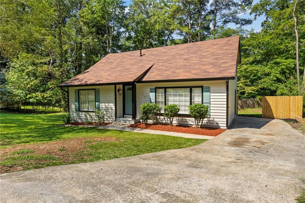 4 bedroom, 2 bathroom, 1,518 sq ft single family residence for sale at 218 Kipling Way, Riverdale, GA 30274 — photo 4
