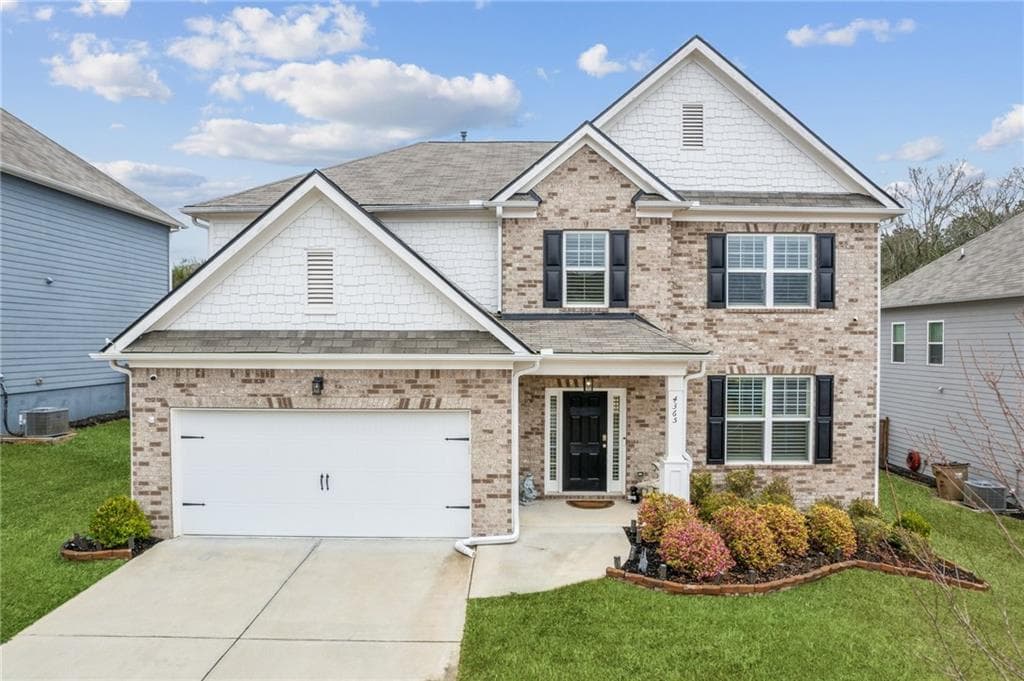 5 bedroom, 3 bathroom, 3,200 sq ft single family residence for sale at 4365 Sunflower Circle, Cumming, GA 30040 — photo 1 of 29