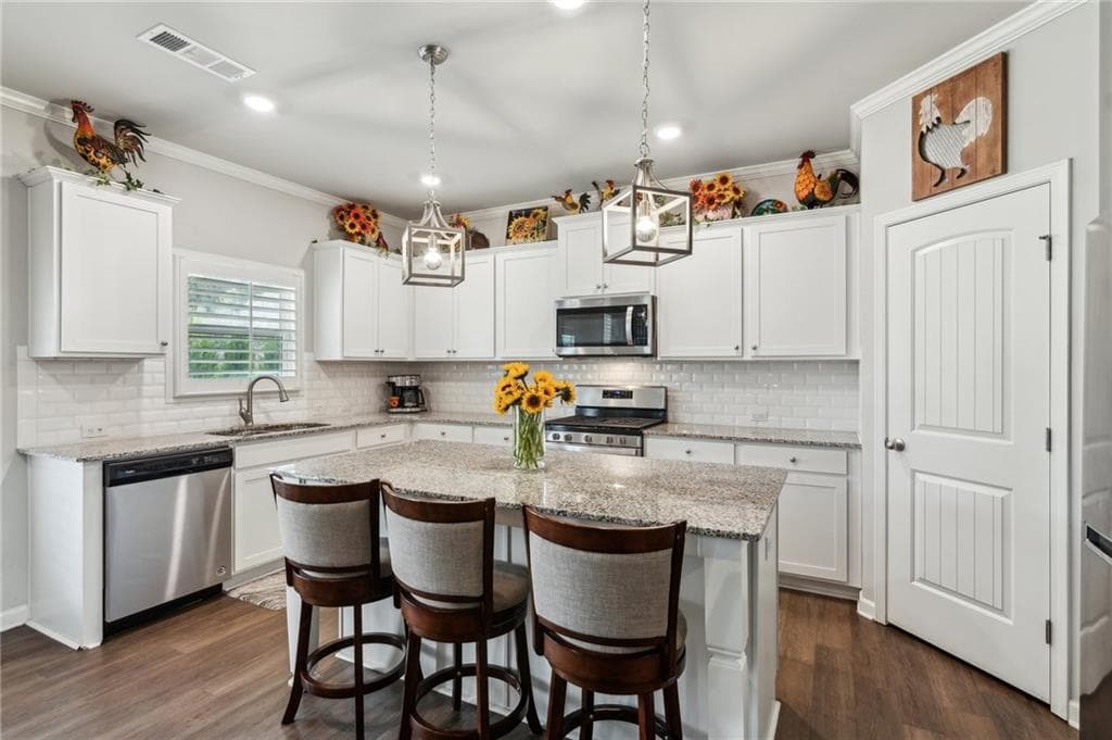 5 bedroom, 3 bathroom, 3,200 sq ft single family residence for sale at 4365 Sunflower Circle, Cumming, GA 30040 — photo 8