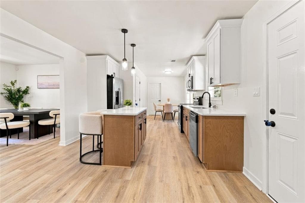 5 bedroom, 3 bathroom, 2,331 sq ft single family residence for sale at 4804 Thompson Mill Road, Lithonia, GA 30038 — photo 8