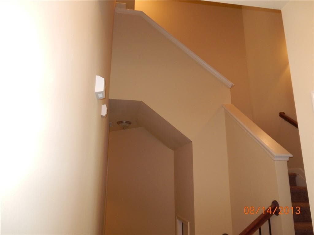 4 bedroom, 3 bathroom, 1,835 sq ft single family residence for sale at 1549 Swamp Cabbage Drive, Lawrenceville, GA 30045 — photo 2
