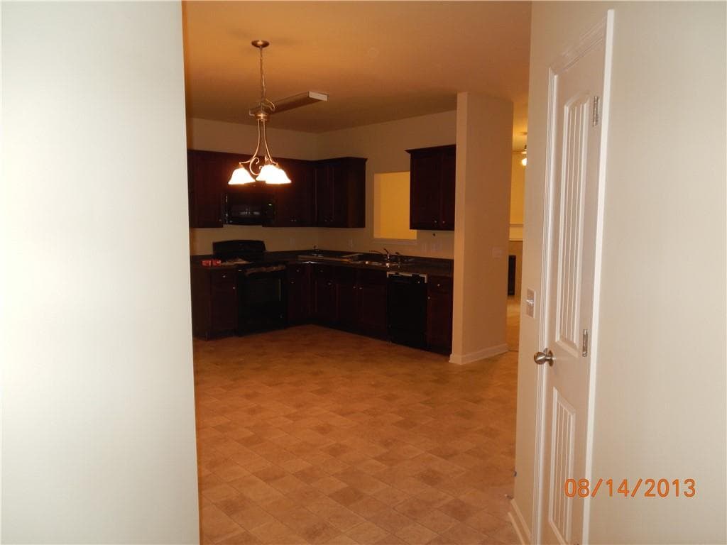 4 bedroom, 3 bathroom, 1,835 sq ft single family residence for sale at 1549 Swamp Cabbage Drive, Lawrenceville, GA 30045 — photo 4
