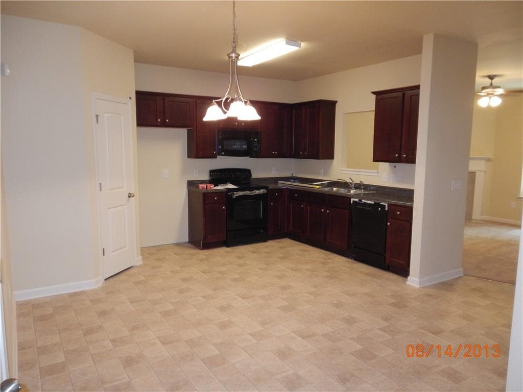 4 bedroom, 3 bathroom, 1,835 sq ft single family residence for sale at 1549 Swamp Cabbage Drive, Lawrenceville, GA 30045 — photo 5