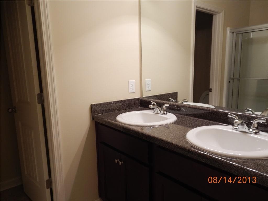 4 bedroom, 3 bathroom, 1,835 sq ft single family residence for sale at 1549 Swamp Cabbage Drive, Lawrenceville, GA 30045 — photo 9