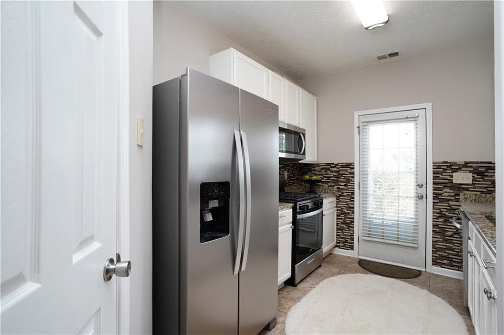 3 bedroom, 3 bathroom, 1,456 sq ft townhouse for sale at 182 Oak Green Drive, Lawrenceville, GA 30044 — photo 7