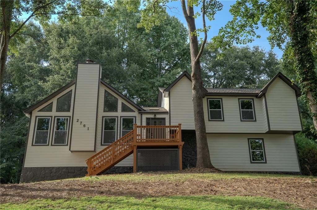 4 bedroom, 3 bathroom, 2,396 sq ft single family residence for sale at 2761 Pine Cone Lane, Duluth, GA 30096 — photo 2