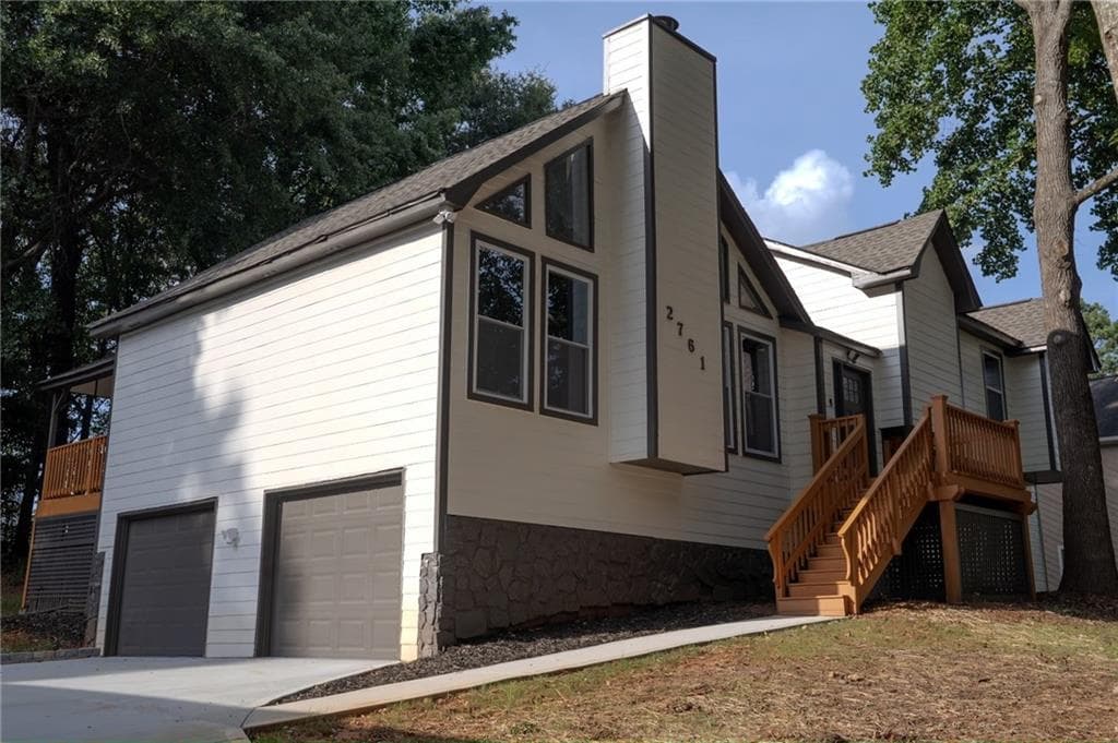 4 bedroom, 3 bathroom, 2,396 sq ft single family residence for sale at 2761 Pine Cone Lane, Duluth, GA 30096 — photo 6