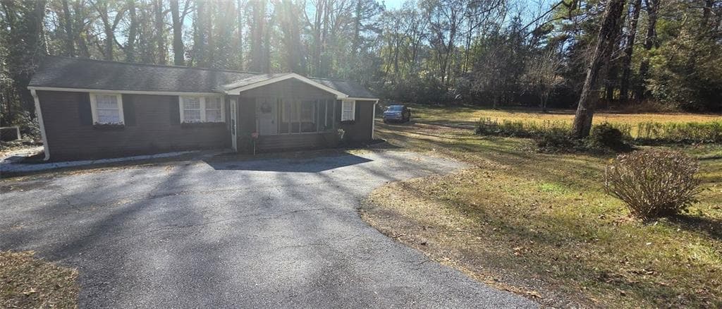 2 bedroom, 1 bathroom, 1,008 sq ft single family residence for sale at 7043 S Goddard Road, Stonecrest, GA 30038 — photo 3