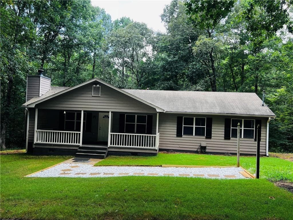 4 bedroom, 2 bathroom, 1,456 sq ft single family residence for sale at 260 New Hope Drive, Mcdonough, GA 30252 — photo 2