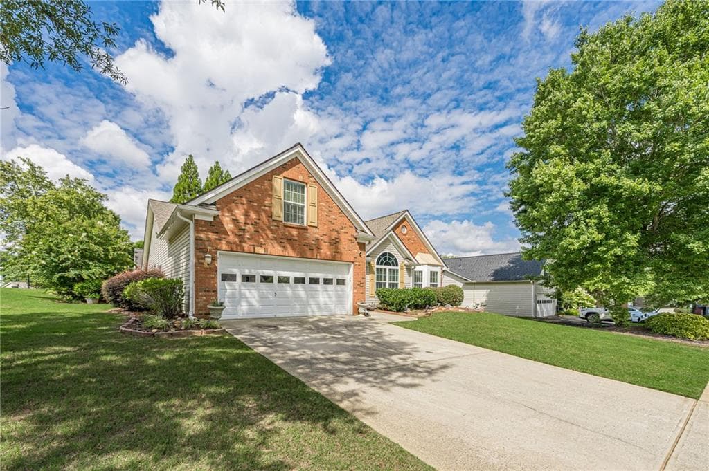 4 bedroom, 2 bathroom, 2,340 sq ft single family residence for sale at 306 Reliance Way, Dacula, GA 30019 — photo 4