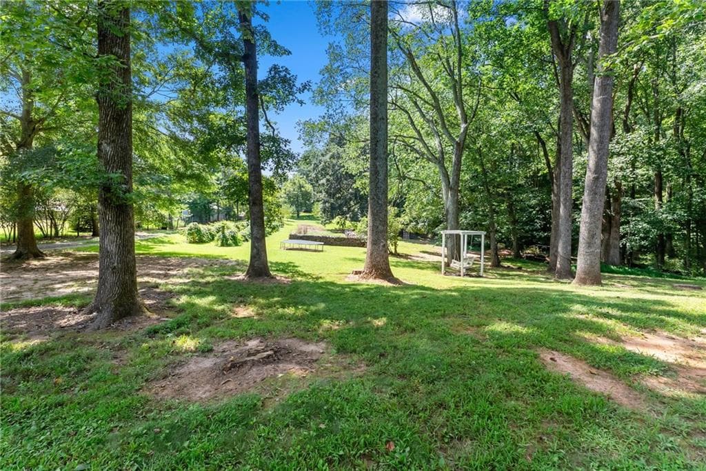 3 bedroom, 3 bathroom, 1,582 sq ft single family residence for sale at 4945 Mccoy Circle, Cumming, GA 30040 — photo 8