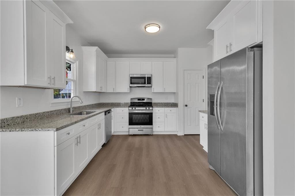 3 bedroom, 2 bathroom, 2,038 sq ft single family residence for sale at 9757 Washington Circle, Jonesboro, GA 30238 — photo 4