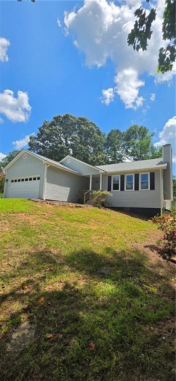 3 bedroom, 2 bathroom, 1,296 sq ft single family residence for sale at 1312 Smokerise Lane, Auburn, GA 30011 — photo 2