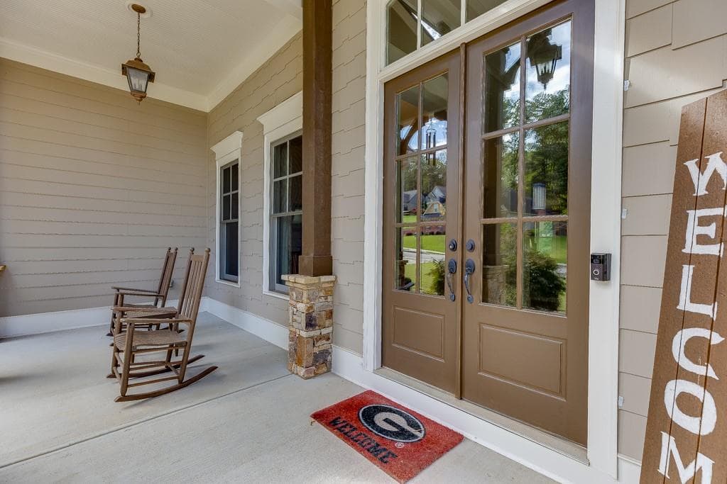 5 bedroom, 4 bathroom, 4,600 sq ft single family residence for sale at 411 Meadow Lake Terrace Road, Hoschton, GA 30548 — photo 2