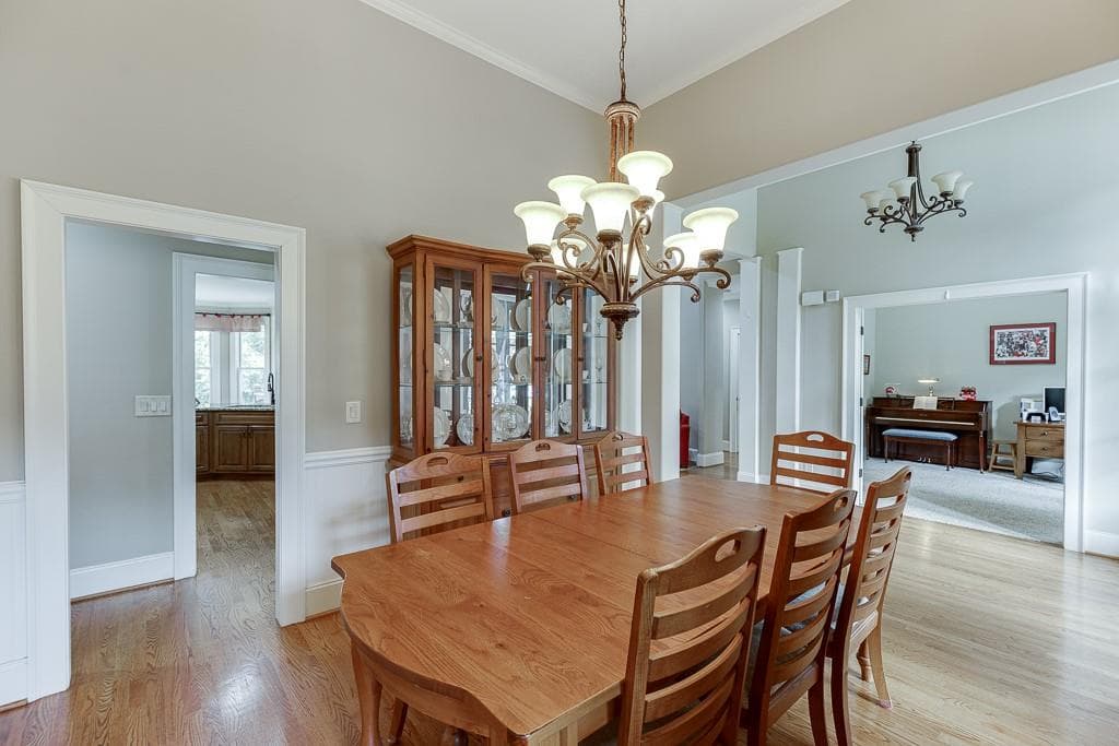 5 bedroom, 4 bathroom, 4,600 sq ft single family residence for sale at 411 Meadow Lake Terrace Road, Hoschton, GA 30548 — photo 4