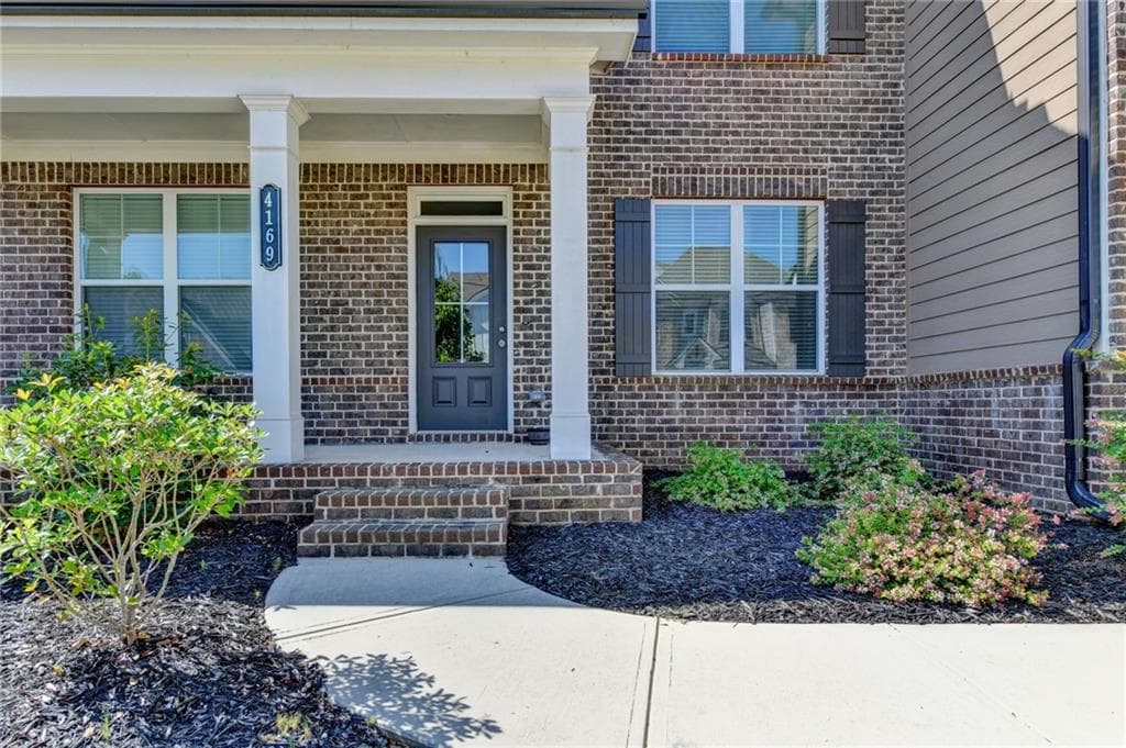 5 bedroom, 4 bathroom, 3,860 sq ft single family residence for sale at 4169 Brookmont Way, Auburn, GA 30011 — photo 5