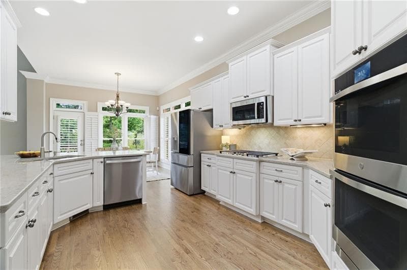 6 bedroom, 7 bathroom, 5,542 sq ft single family residence for sale at 14695 Timber Point, Milton, GA 30004 — photo 5