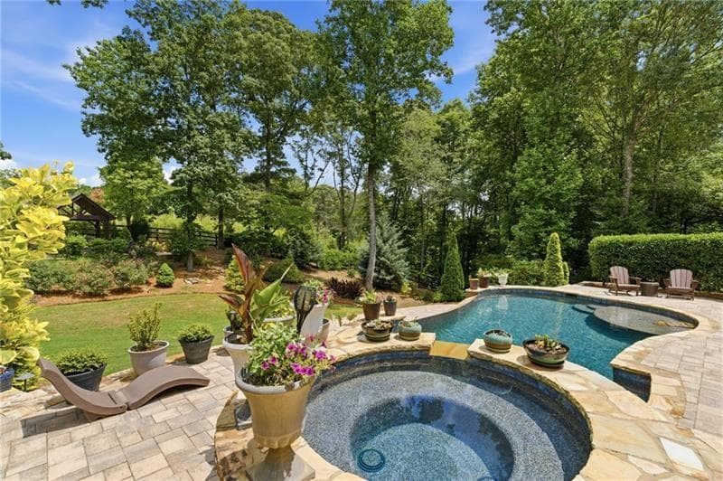 6 bedroom, 7 bathroom, 5,542 sq ft single family residence for sale at 14695 Timber Point, Milton, GA 30004 — photo 8