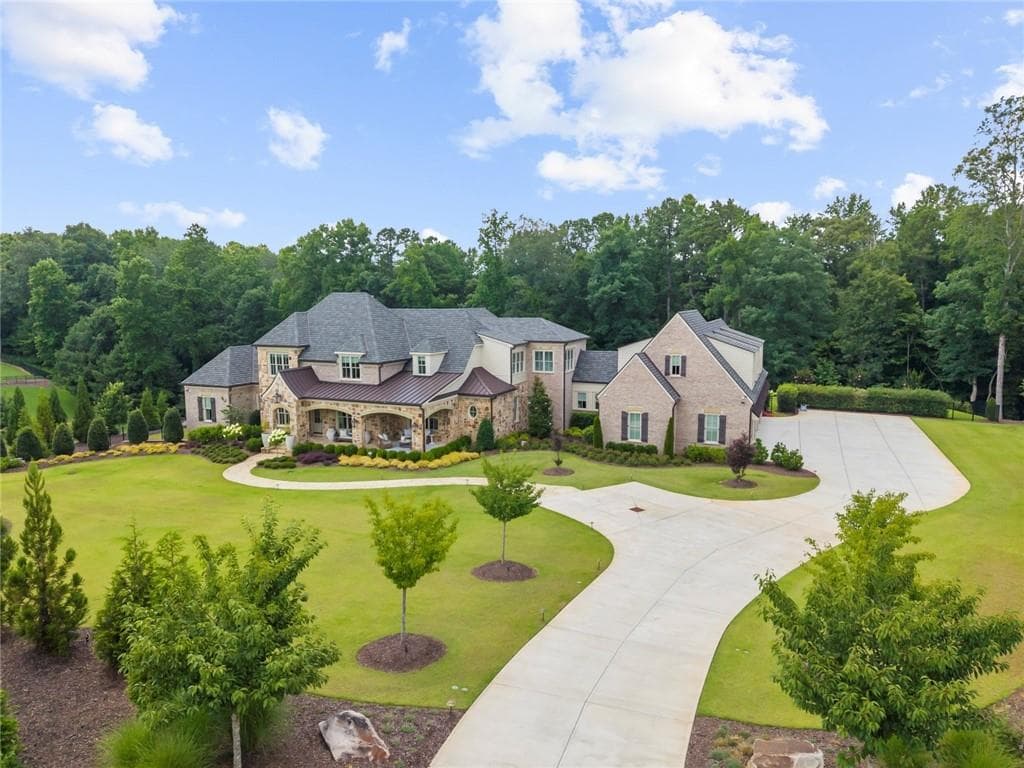 7 bedroom, 9 bathroom, 13,050 sq ft single family residence for sale at 570 Lost River Bnd, Milton, GA 30004 — photo 2