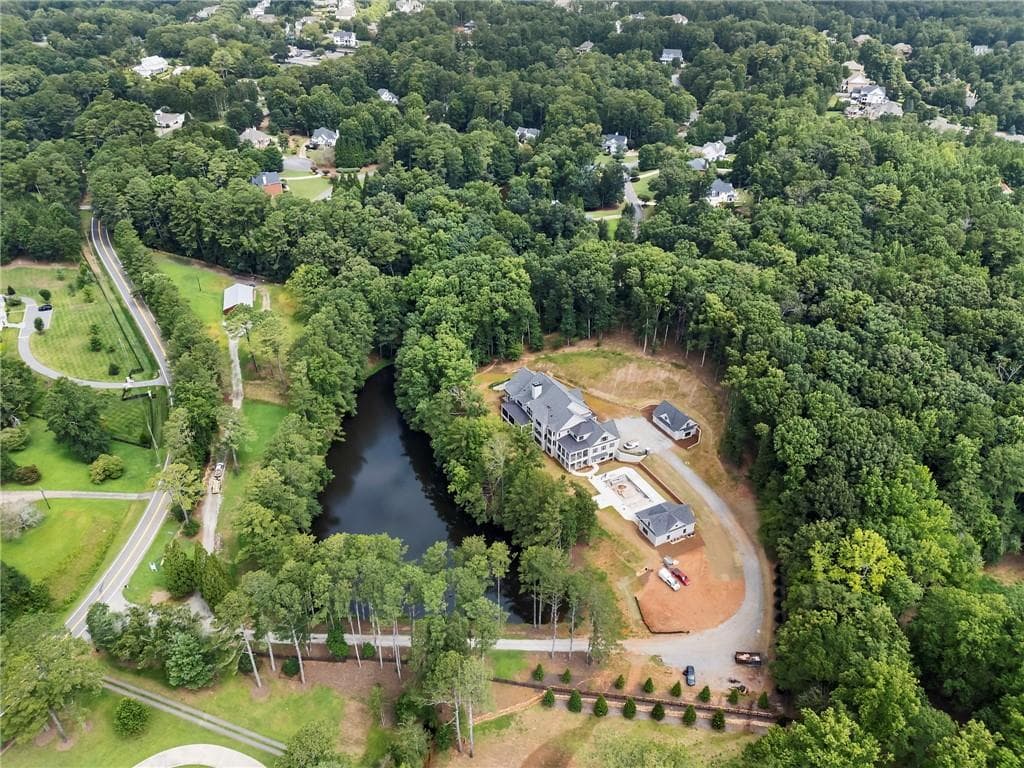 7 bedroom, 11 bathroom, 24,486 sq ft single family residence for sale at 13675 Freemanville Road, Milton, GA 30004 — photo 4