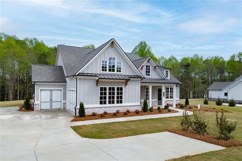 4 bedroom, 4 bathroom, 3,440 sq ft single family residence for sale at 5450 Settingdown Road, Cumming, GA 30041 — photo 2