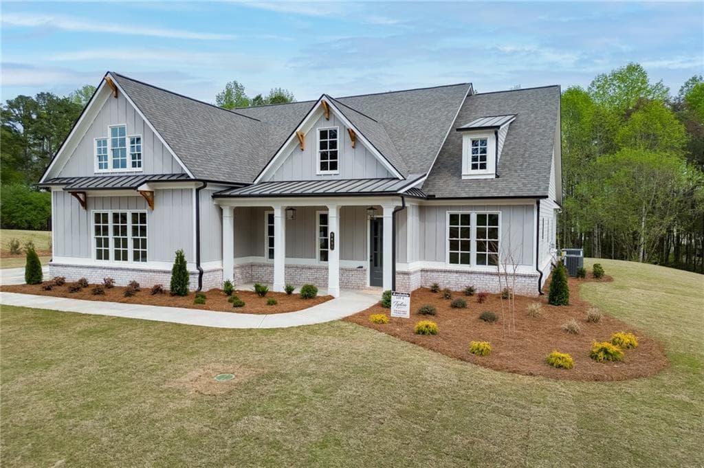 4 bedroom, 4 bathroom, 3,440 sq ft single family residence for sale at 5450 Settingdown Road, Cumming, GA 30041 — photo 3