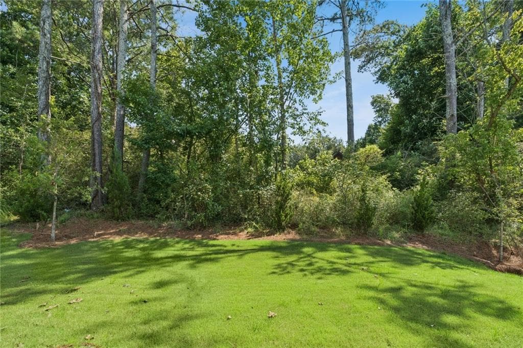 4 bedroom, 5 bathroom, 3,012 sq ft single family residence for sale at 4515 Beechnut Circle, Cumming, GA 30028 — photo 3