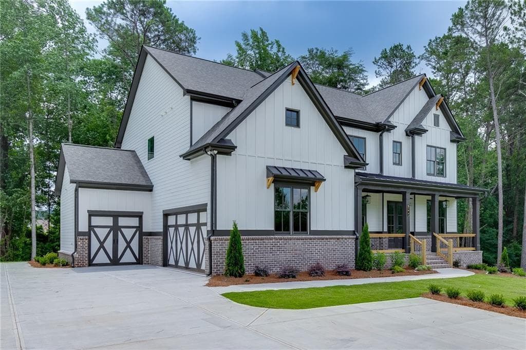 5 bedroom, 4 bathroom, 4,159 sq ft single family residence for sale at 5370 Settingdown Road, Cumming, GA 30041 — photo 2